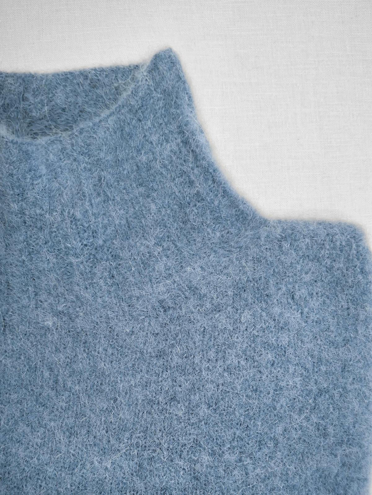 Maglia collo alto alpaca baby e lana merino