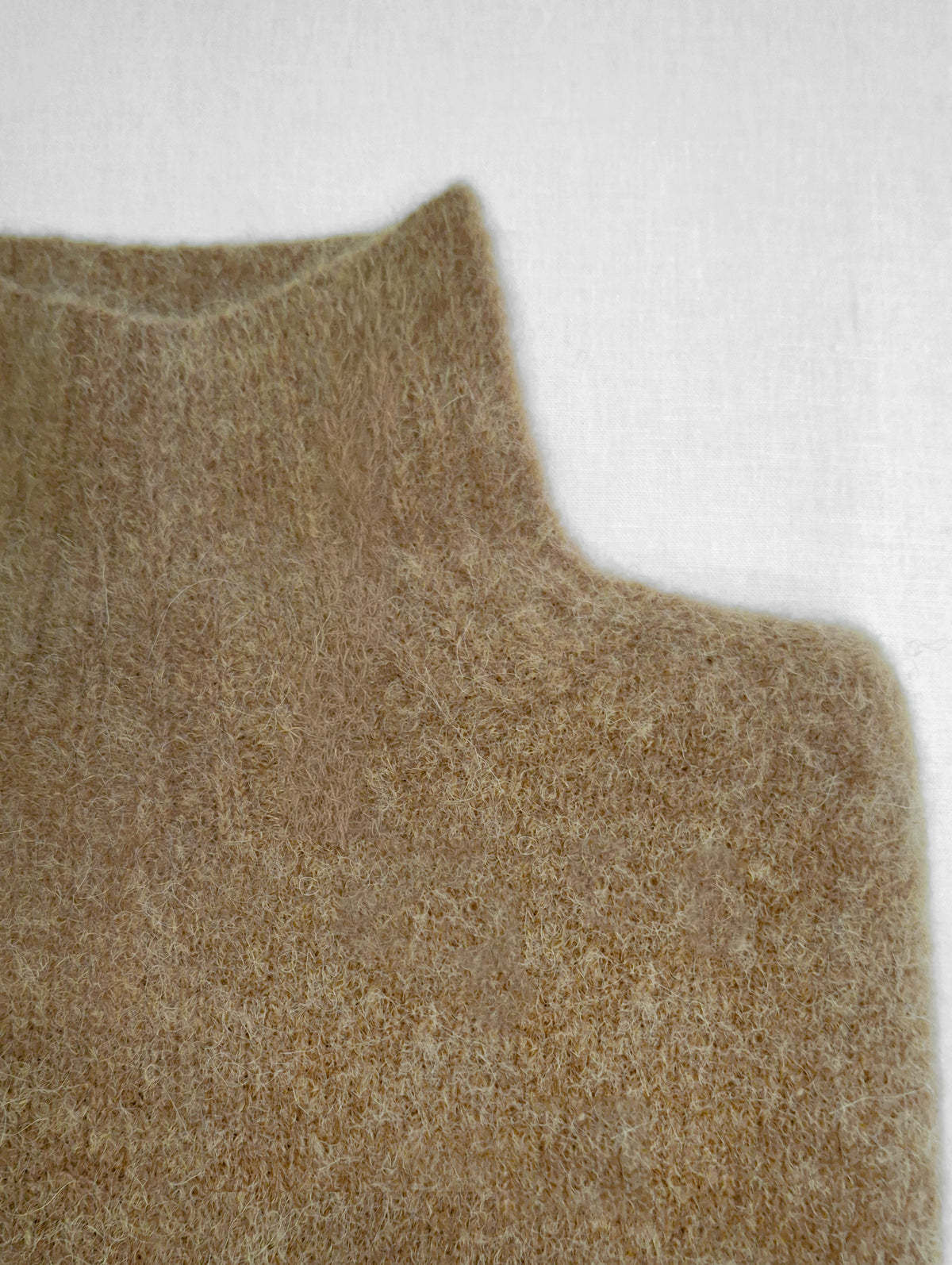 Maglia collo alto alpaca baby e lana merino