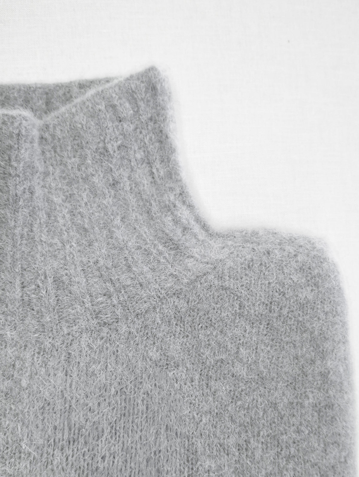 Maglia collo alto alpaca baby e lana merino
