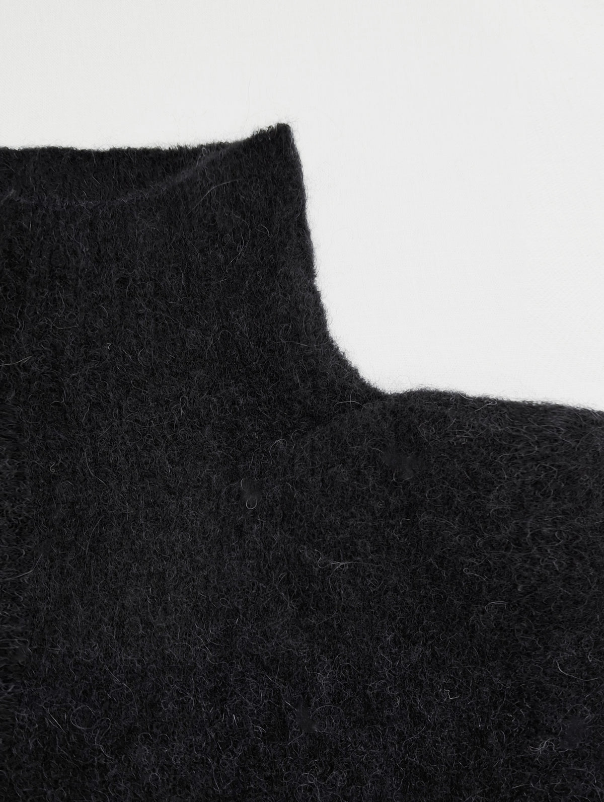 Maglia collo alto alpaca baby e lana merino